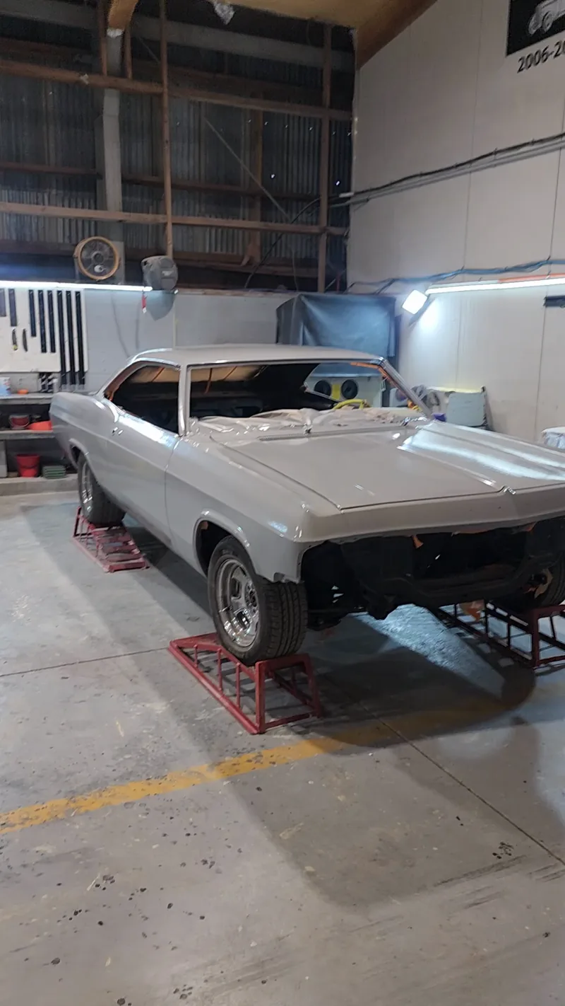 The 1965 Chevrolet Impala at Kohl Customs, from the spray booth through to the finished grey car