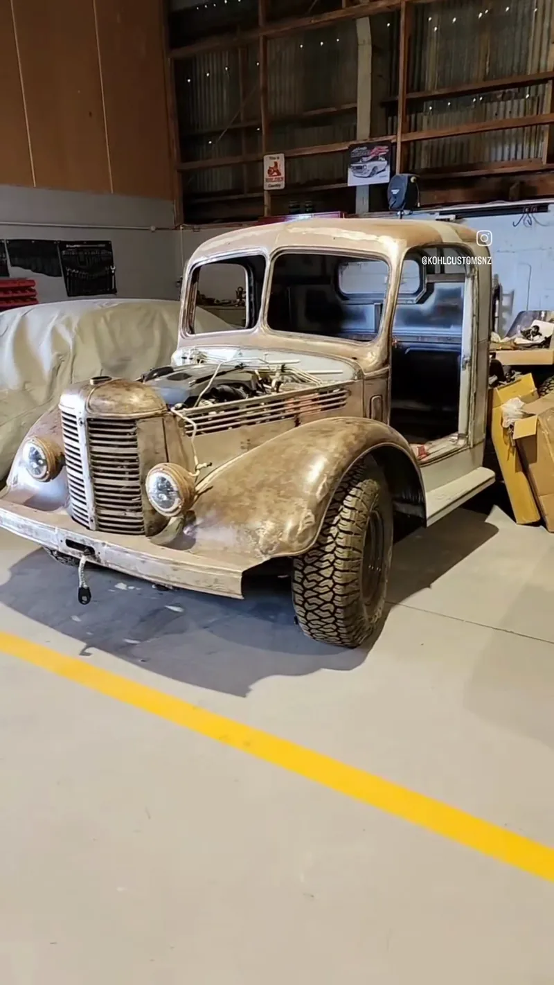 The bare-metal Bedford cab mounted on the Colorado chassis for the first time, front three-quarter view
