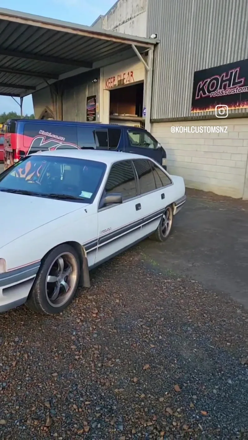 Benny's VN Commodore as it arrived at Kohl Customs, in its original white with a side stripe