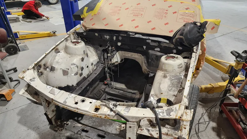The VN Commodore engine bay stripped completely bare before painting