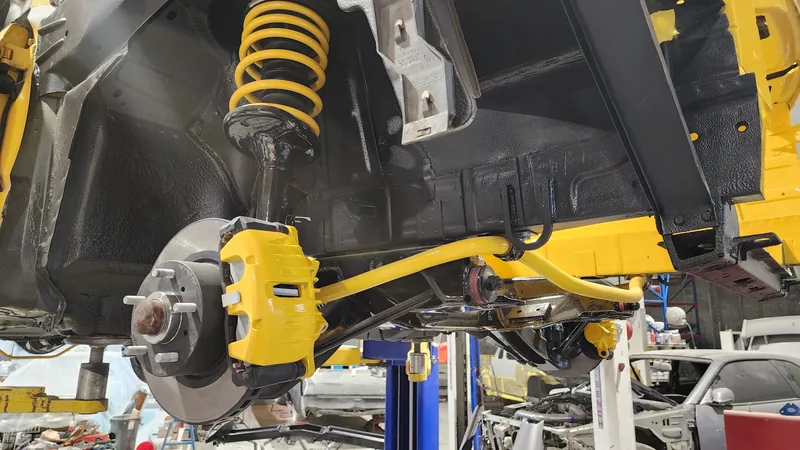 Rebuilt front suspension and VT front brakes on the VN Commodore, painted in body colour