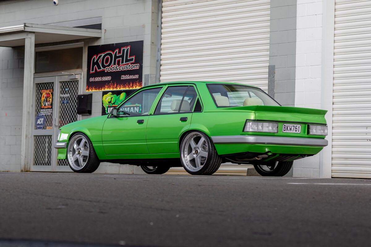 Finished 1983 VH Holden Commodore restoration in candy green, rear three-quarter view outside the Kohl Customs workshop