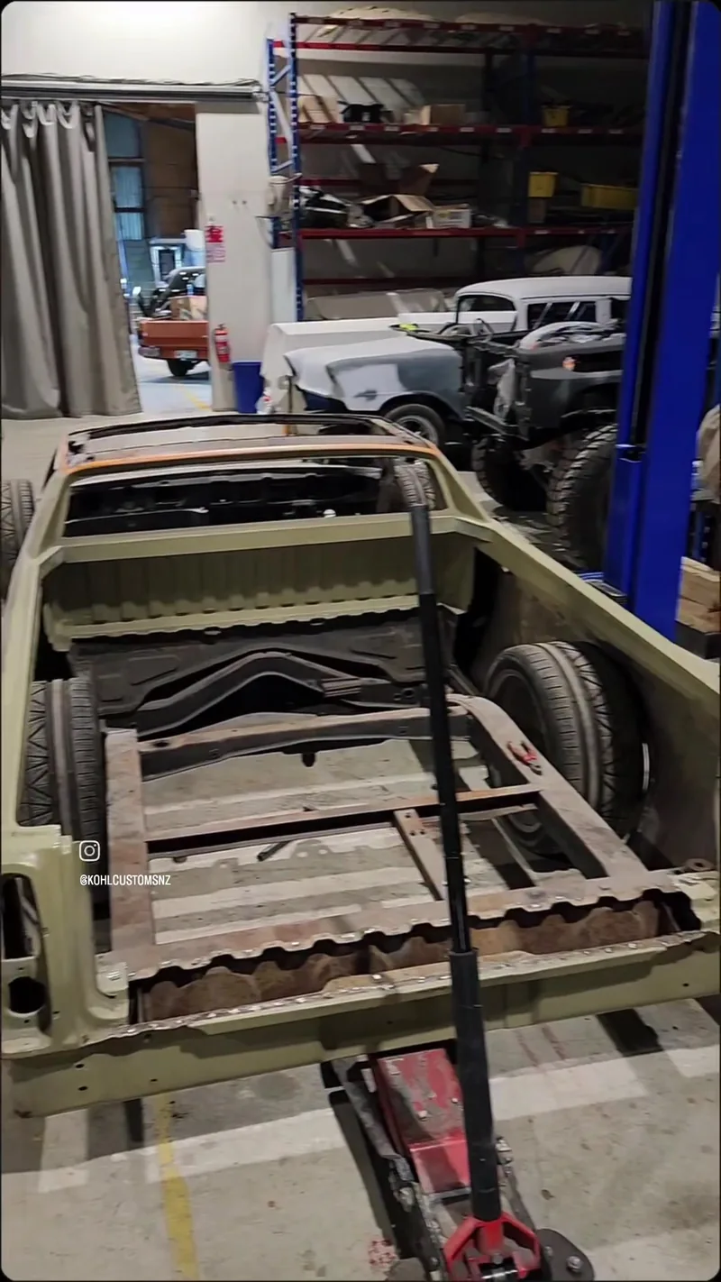 The bare tray tub of the HJ Holden ute with the original floor cut out