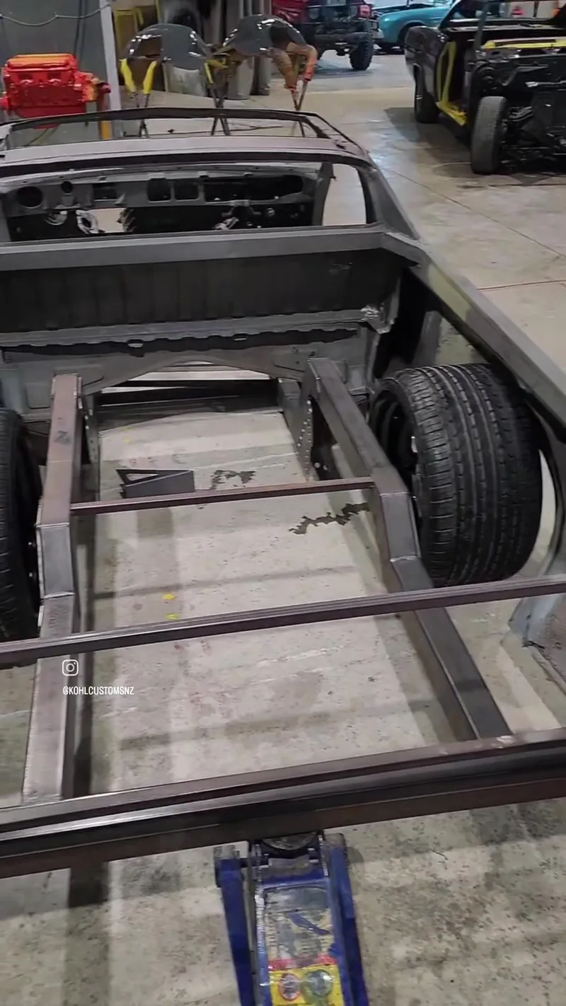Chassis rails and tray framing fabricated in bare steel for the HJ Holden ute at Kohl Customs