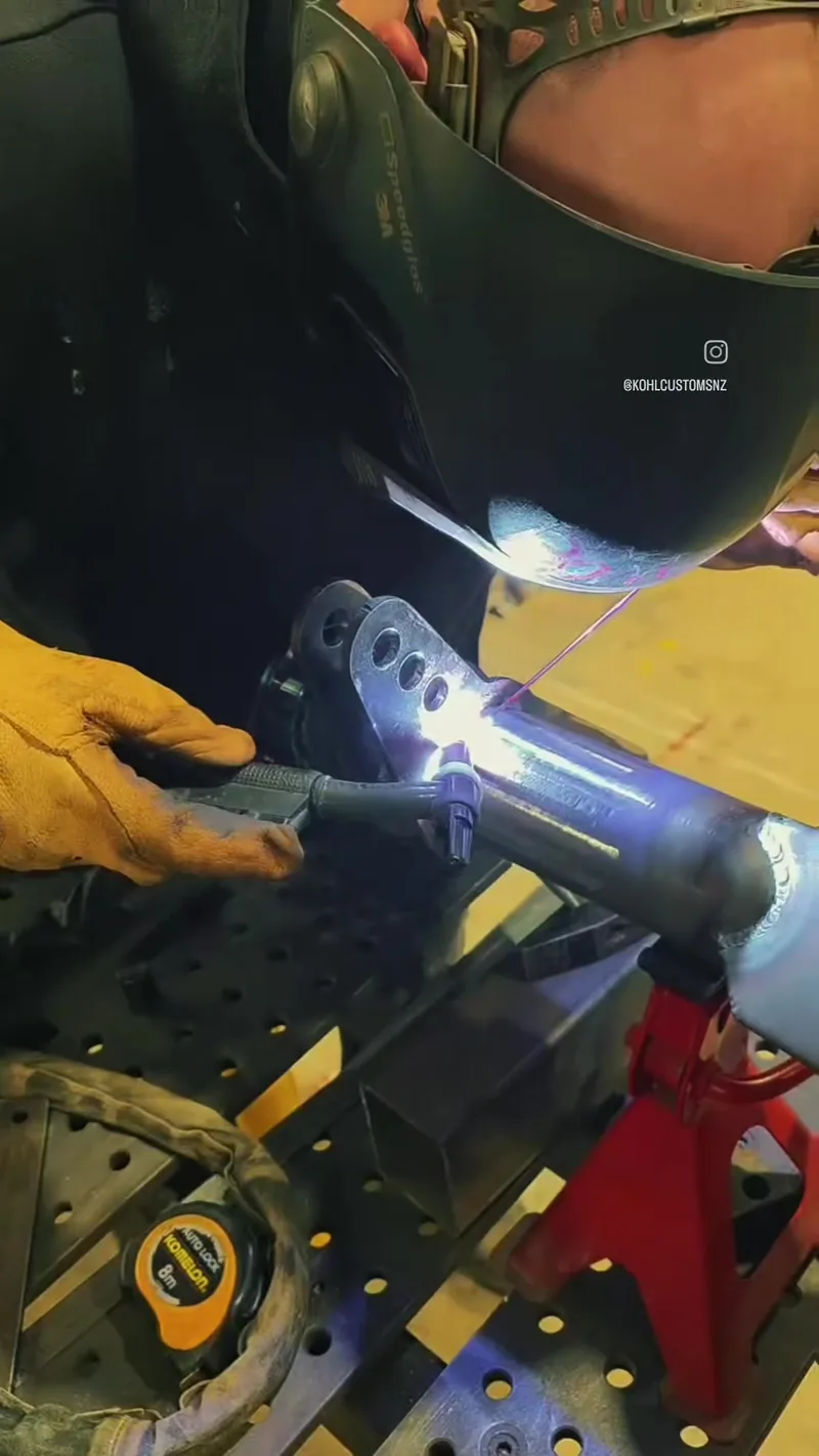 TIG welding brackets onto the fabricated rear axle housing for the HJ Holden ute